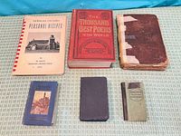 Six books laid out showing front covers