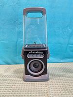Front view of Eddie Bauer iCanister speaker showing driver and clear upper section