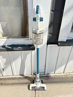 Full view of Eureka RapidClean Pro stick vacuum standing upright