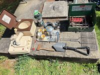 Full layout of camping items on concrete surface