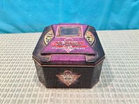 Yu-Gi-Oh! metal storage tin closed, showing graphics