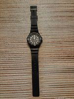 Full view of watch front, strap extended