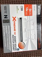 Front view of retail box displaying D-Link DIR-655 Extreme N gigabit router image and specifications