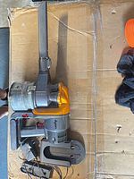 overall view of vacuum with dock, charger and nozzle