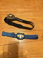Overview of both headlamps showing colors, straps, and general condition