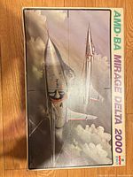 Front of box with Mirage Delta 2000 artwork