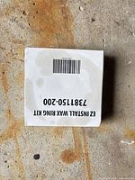 Top view of EZ Install Wax Ring Kit box showing model number 7381150-200