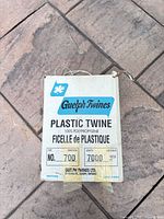 Front of box showing brand, material, size and model information