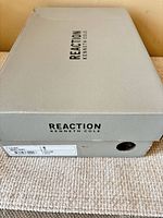 Kenneth Cole Reaction shoe box exterior showing brand and size label