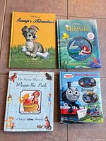 Group shot of all four hardcover children’s books