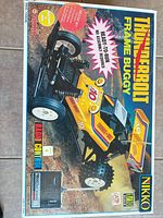 Front of retail box showing Nikko Thunderbolt Frame Buggy graphics