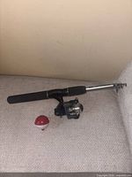 Rod with reel and bobber displayed
