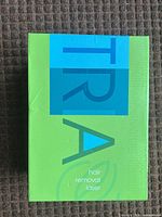Front of green Tria hair removal laser box