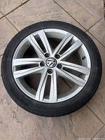 Full view of Volkswagen 17 inch alloy wheel with mounted tire
