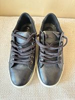 Top view of both sneakers showing overall condition