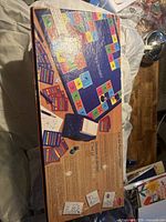 Back of Pictionary game box with game components