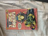 Red-background Judge Dredd comic in sleeve