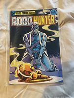 Front cover of Robo Hunter issue 5 comic book in protective sleeve