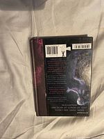 Back cover with barcode and synopsis
