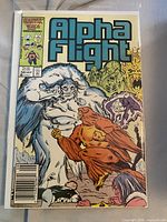 Alpha Flight #32 in bag and board