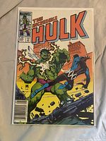 Cover showing Hulk smashing robot with debris