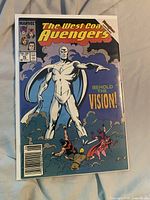 Issue #45 cover with white Vision floating, bagged