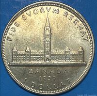 Reverse side of 1939 Canadian silver dollar with Parliament design