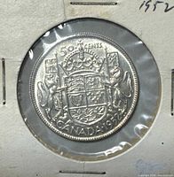 Reverse of 1952 Canadian 50-cent coin showing coat of arms