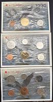 Three Royal Canadian Mint proof-like coin sets sealed in cellophane on backing cards