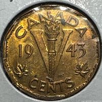Reverse side with V torch design, date 1943, maple leaves, CENTS legend