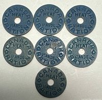 Group view of all seven blue meat ration tokens