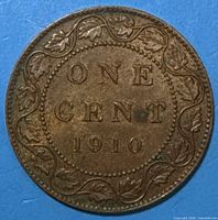 Reverse of 1910 Canadian large cent showing denomination and date