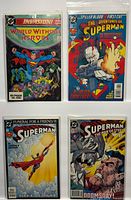 Group shot of all four bagged and boarded comics