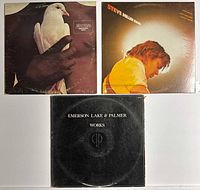 Group shot of three LPs showing front covers