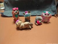 Front view of all five flocked figures