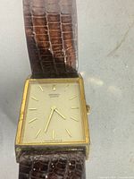 Front view of Seiko rectangular quartz watch showing dial, case and strap