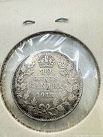 Reverse of 1918 Canada dime showing crown, denomination, wreath and date