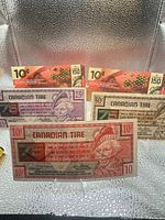 Front view of all five Canadian Tire notes displayed upright