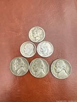 Group shot of all six U.S. coins laid out in triangular arrangement