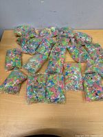 overview of all bags of luminous stones spread on table