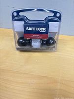 Front view of sealed Safe Lock by Weiser keyed entry knob set package