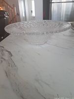 side profile of cut crystal bowl on countertop