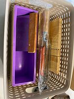 Entire kit inside basket: silicone mold in wooden box, straight cutter, crinkle cutter in plastic