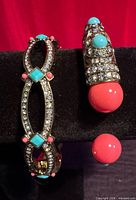 Front view of both Heidi Daus cuff bracelets showing crystal, turquoise and coral embellishments