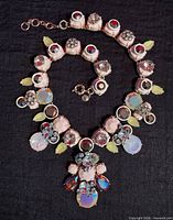 Full view of necklace laid flat showing all stones and adjustable clasp