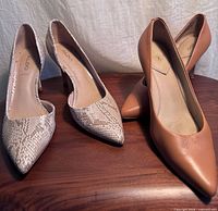 Front view showing both pairs upright on table