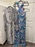 Full view of both garments on hangers