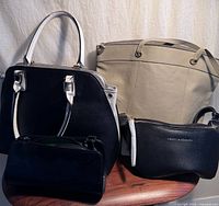 Group shot of all four handbags