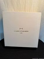 White Marc Fisher LTD shoe box top