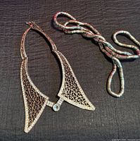 Overall view of collar necklace and snake chain